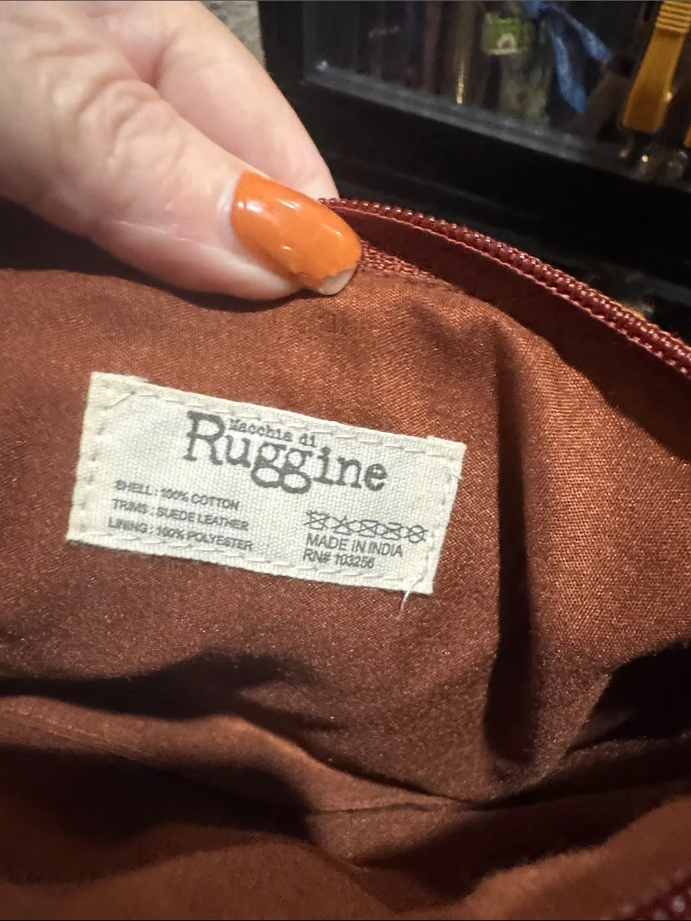 A Ruggine Hand-beaded Wristlet Clutch